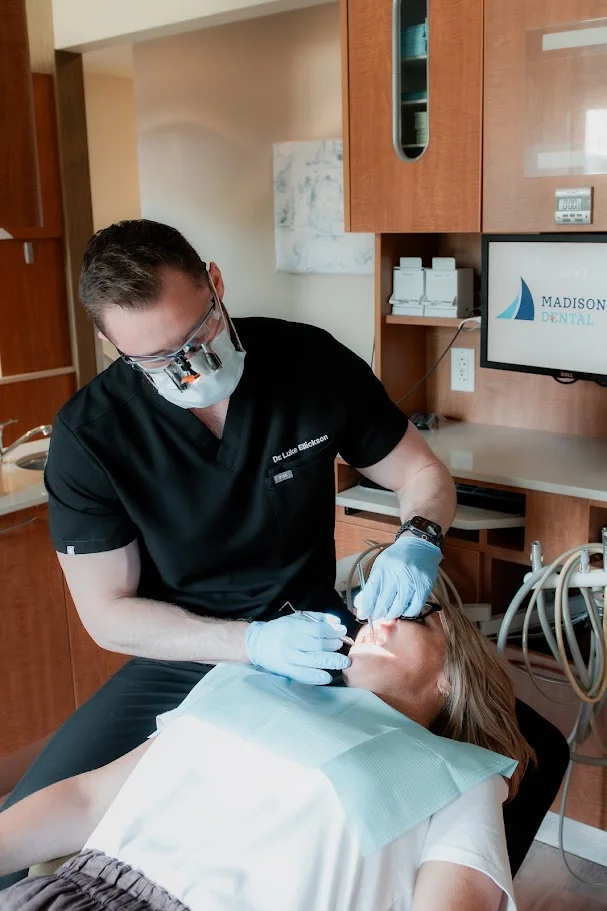 Dr. Ellickson performing a dental procedure with modern equipment